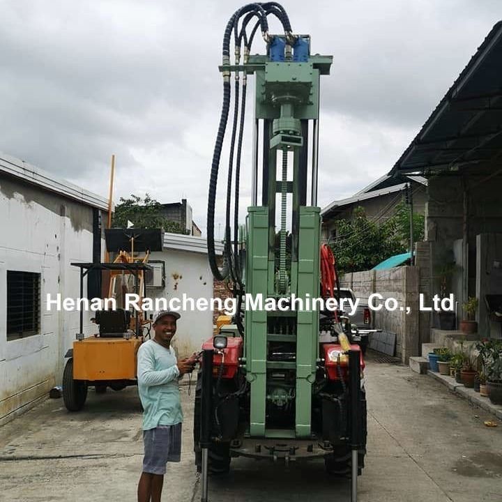 DTH Máy khoan giếng nước thủy lực 200m Máy khoan máy kéo khí nén di động